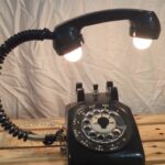 Two light lamp made from a black, vintage telephone.