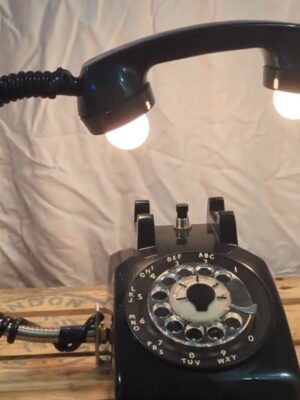 Two light lamp made from a black, vintage telephone.