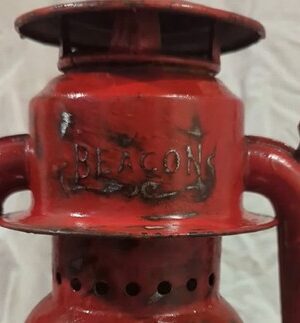 Beacon logo on red railroad lantern