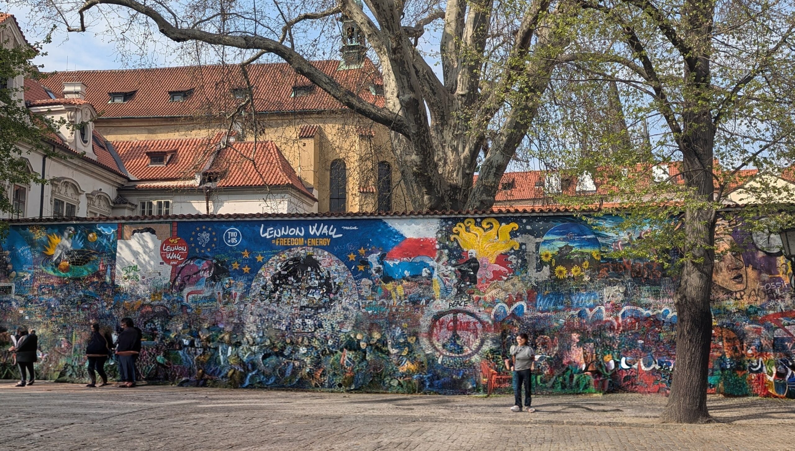 The colourful, graffiti wall inspired by John Lennon and peace. Covered over hundreds of times by the authorities, it prevailed and became a symbol of a new era.