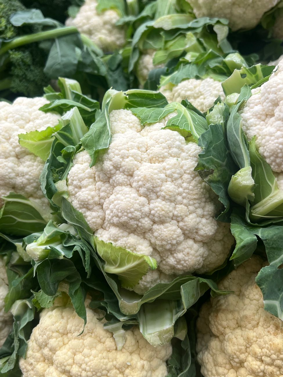 fresh organic cauliflower close up in market