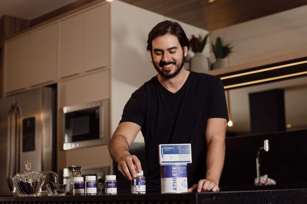 man taking supplements