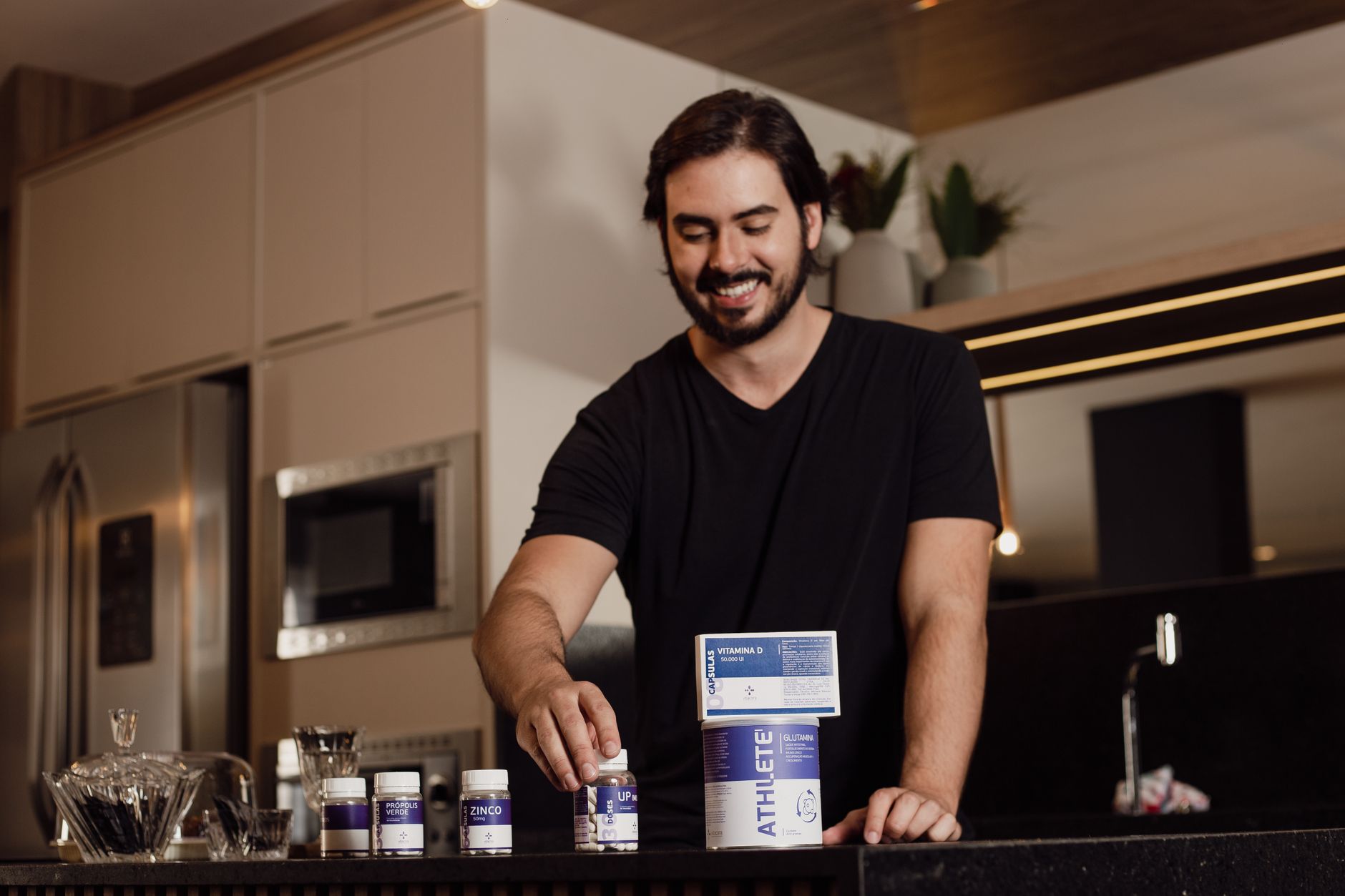man taking supplements