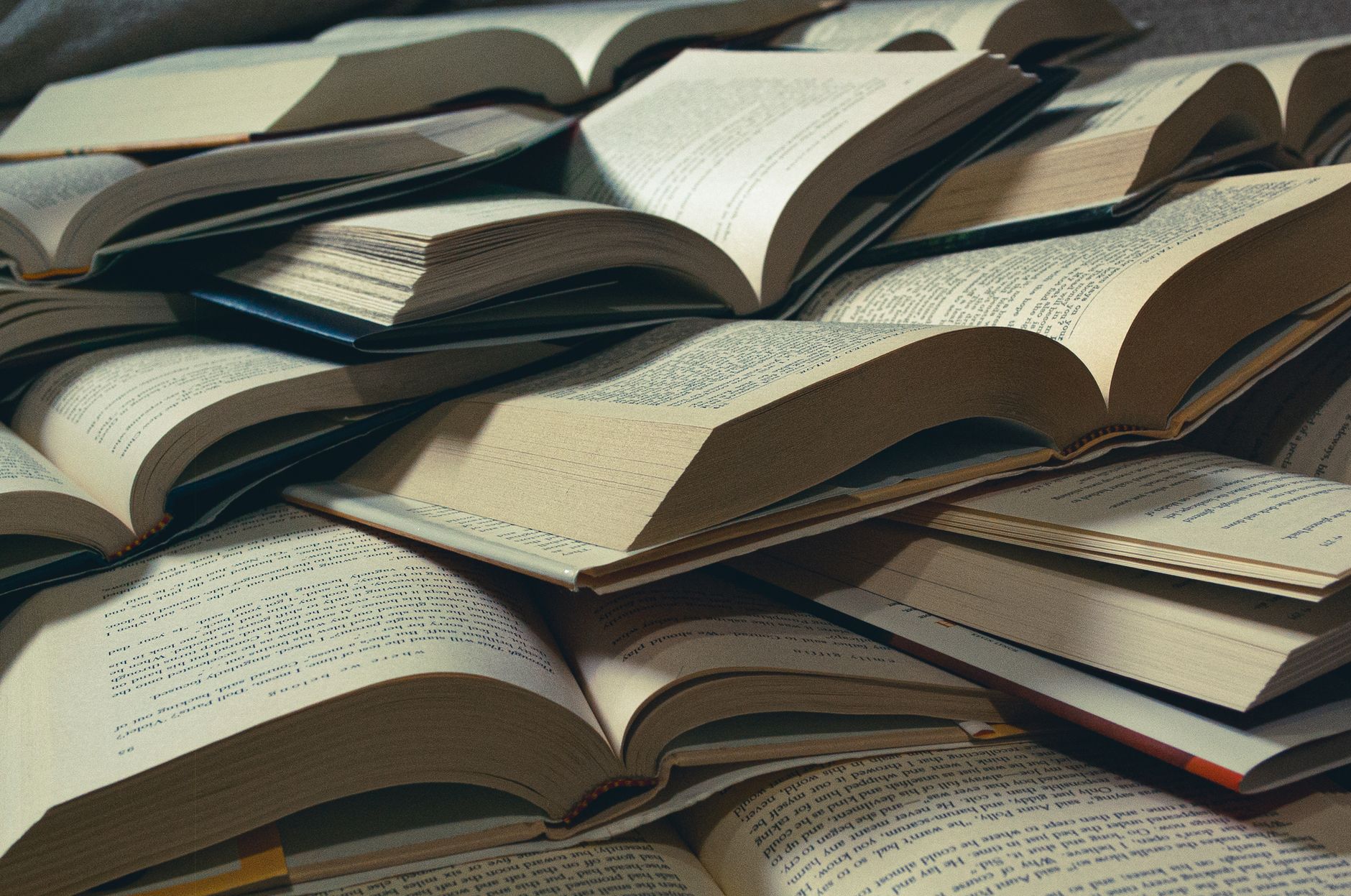 stacked opened books